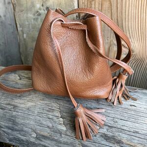 SHAFFER Los Angeles Greta Brown Leather Mini Bucket Crossbody Bag with Tassels